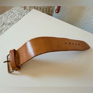 Louis Vuitton Vachetta Poignet Handle with adjustable strap.